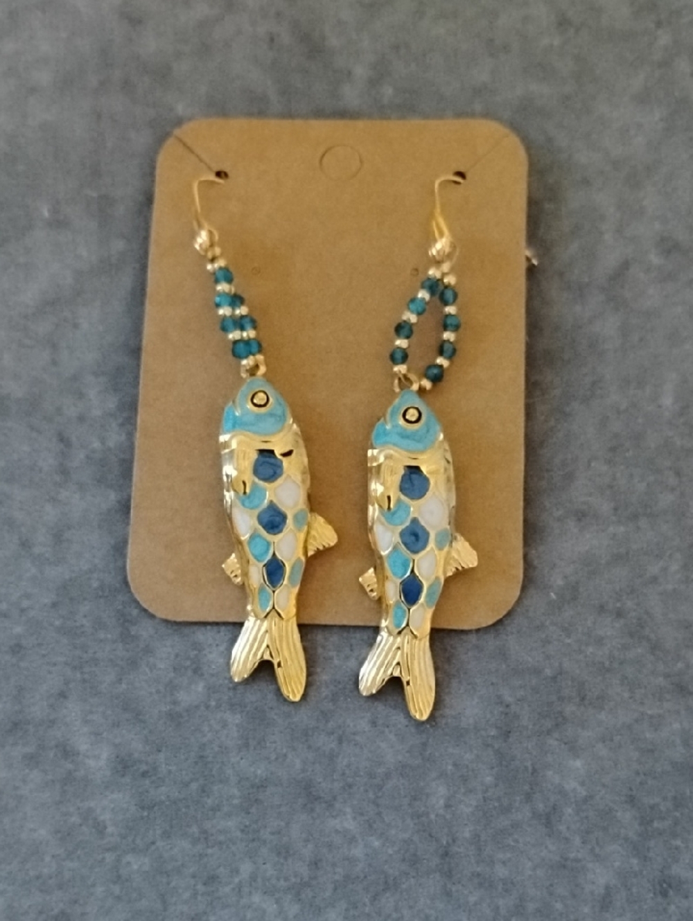 Hand Crafted Blue And White Enamel Fish Earrings With Faceted Neon Apatite